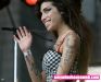 Amy Winehouse tatuaje en el brazo